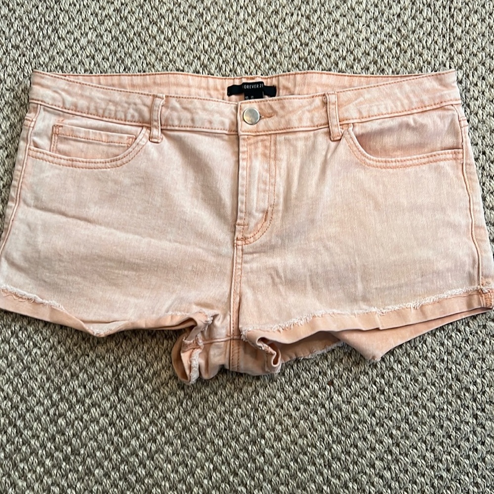 Peach colored, distressed Jean shorts